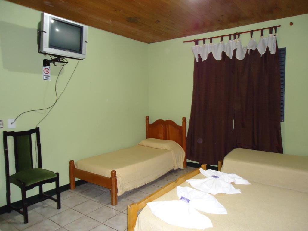 Hosteria Mola Hotell Puerto Iguazú Rom bilde